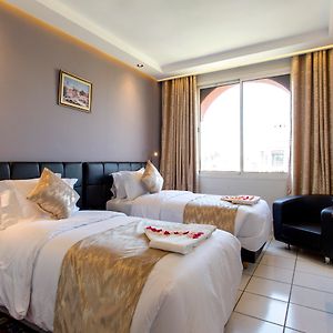 Kamer met een Queen Size Bed